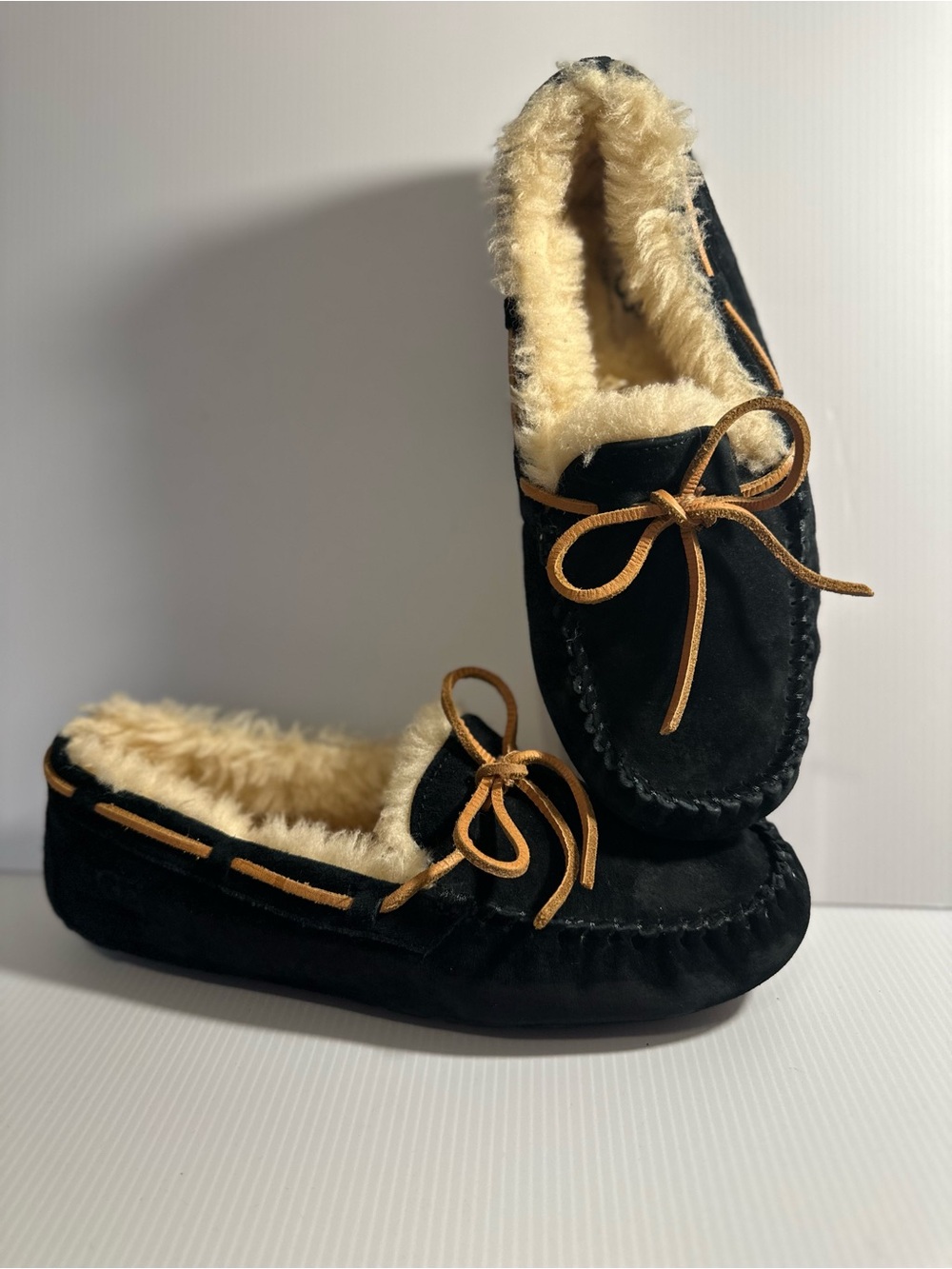 UGG Black Suede Moccasin Slippers with Cream Shearling